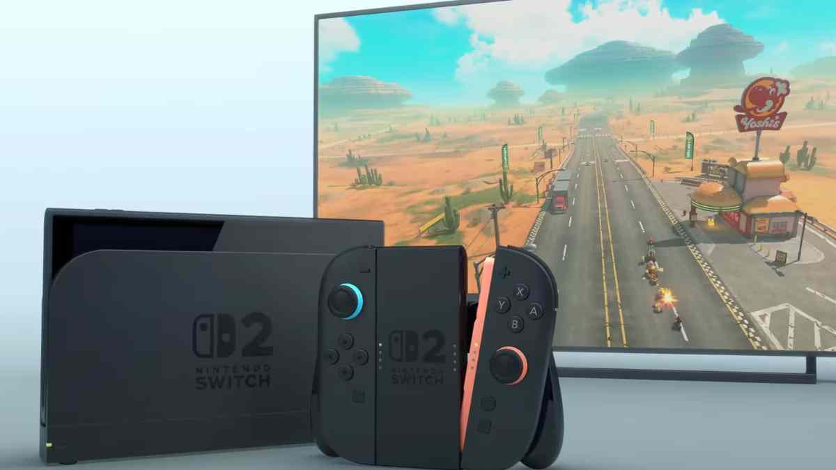 nintendo switch 2 con joy-con negros en modo dock frente a televisor con juego de carreras.