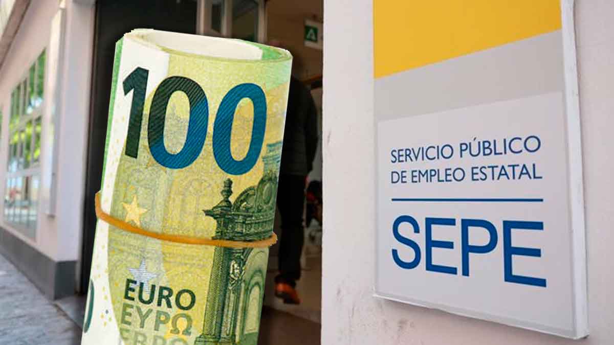 Rollo de billetes de cien euros frente a una oficina del SEPE por el complemento de 500 euros para trabajadores