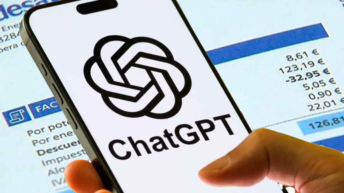 Teléfono móvil con ChatGPT abierto frente a una factura de la luz para reducir el consumo y pagar menos